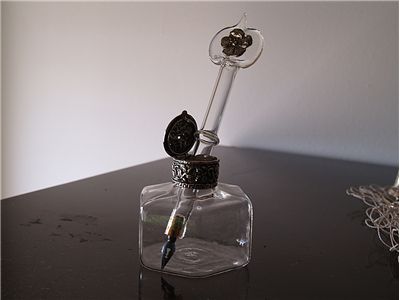 Picture Of Ink Bottle With Pen